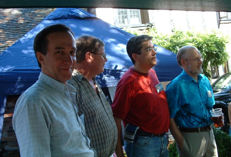 ../Images/Costas-SV1DH, Paul-ZS6NK, Jose-EH7KW and Ian-G3SEK listening to Jimmy's presentation.jpg